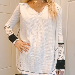 Free people cheetah sleeve sweater!